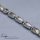 Ezüst baracca jellegű karkötő
