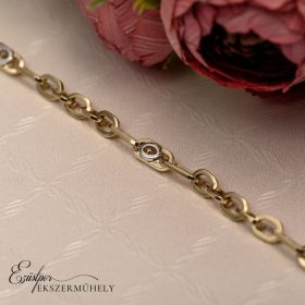 Arany karkötő ovális szemekkel