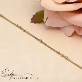 Arany gömbös karkötő